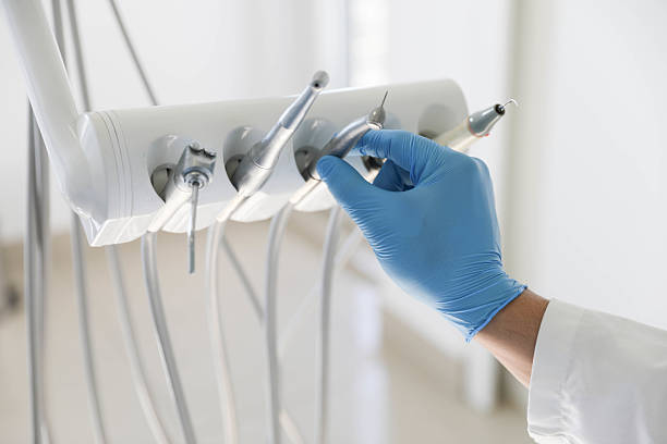 Professional Dental Veneers technician working in Oswego, NY